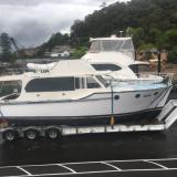 X, 38' Flybridge cruiser built by Wal Shirt.