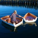 PT Watercraft 's PT 11 nesting dinghy assembles in or out of the water