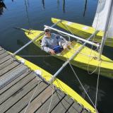 All of the sail-control lines lead to the cockpit within easy reach of the sailor.